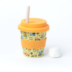 Yellow cup with orange lid and sleeve featuring vehicle illustrations on a white background