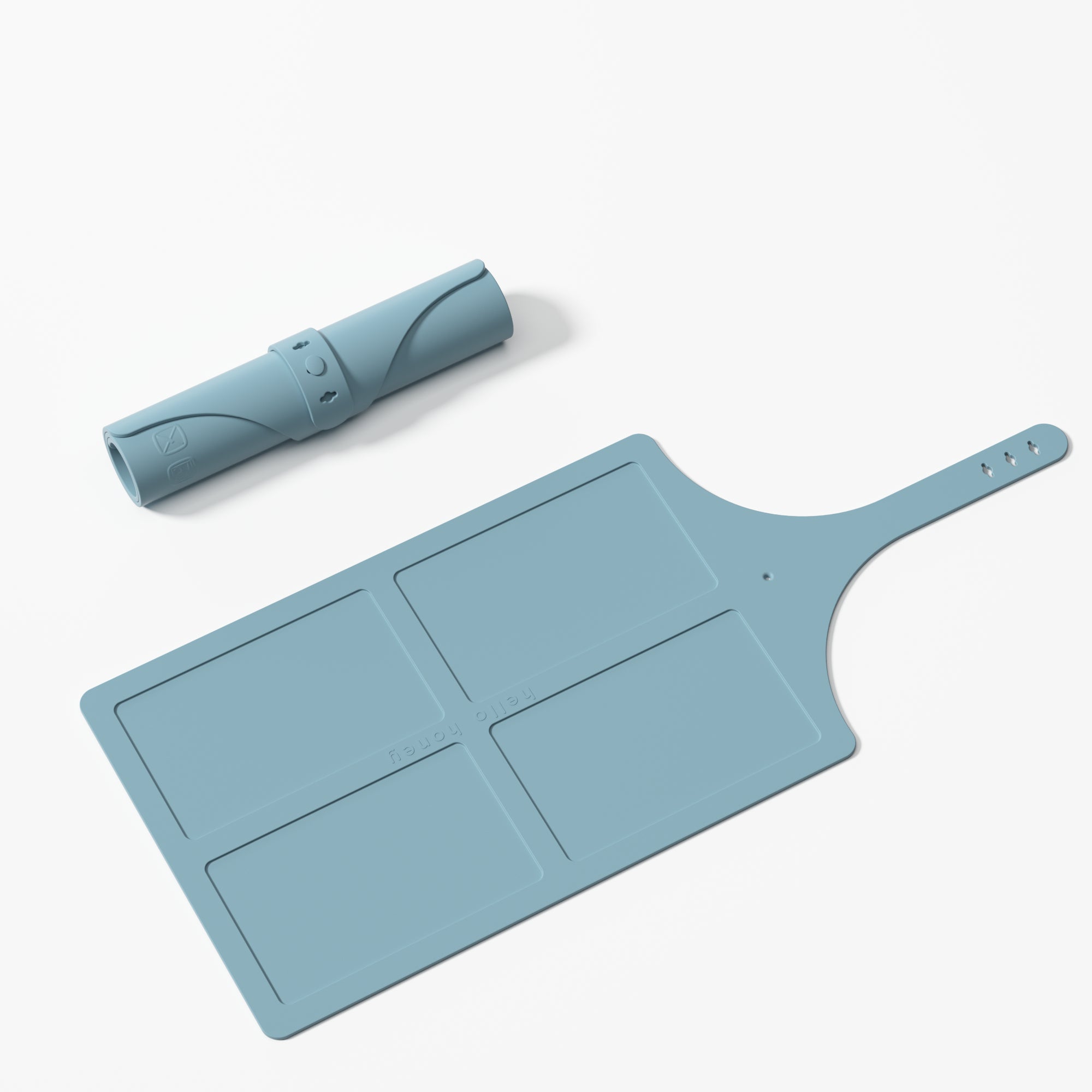 Blue silicone cutting board with handle on a white background