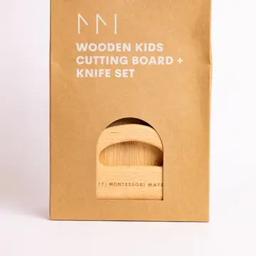 Kraft paper packaging of a wooden kids' cutting board and knife set with a cutout of the product inside.