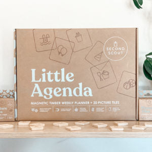 Little Agenda magnetic timer weekly planner box on a wooden surface with a white background