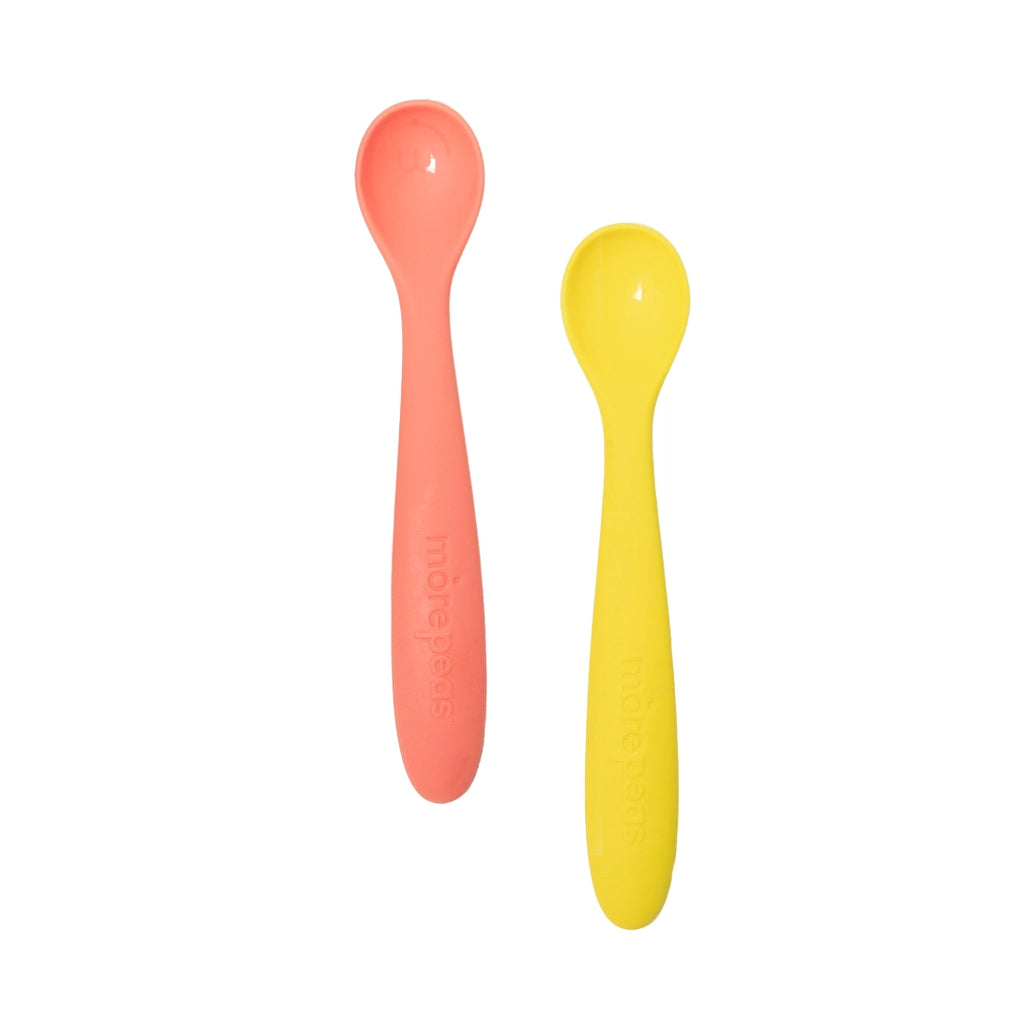 Two colorful baby spoons, one pink and one yellow, on a white background.