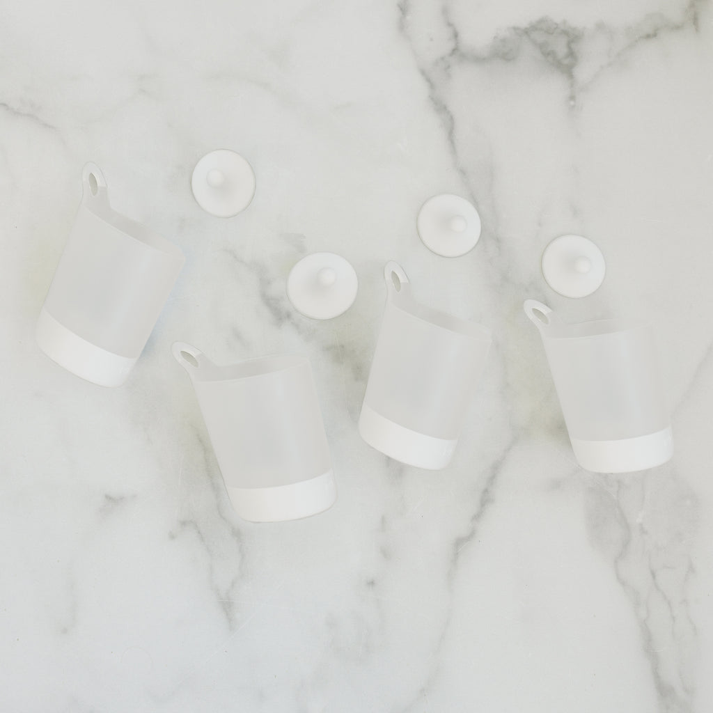 hangable kids cups on a kitchen bench