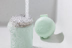 Mint green water dispenser with 'bonnyC' branding on a white background