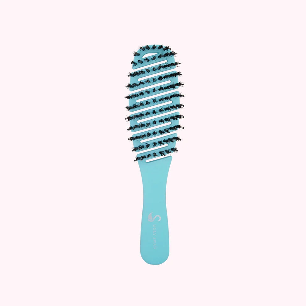 Blue hairbrush with black bristles on a white background