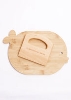 Wooden cutting board with a smaller inset board on a white background