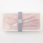 Transparent container with a gray strap on a white background, featuring 'Montessori Mates' branding.