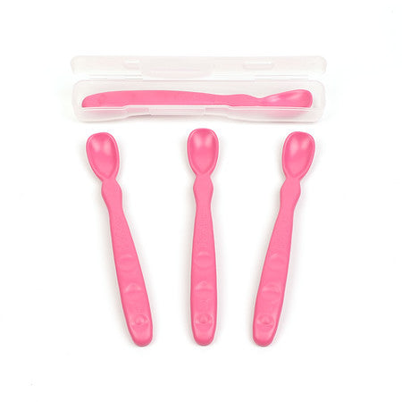 Set of three pink baby spoons with a clear plastic case on a white background
